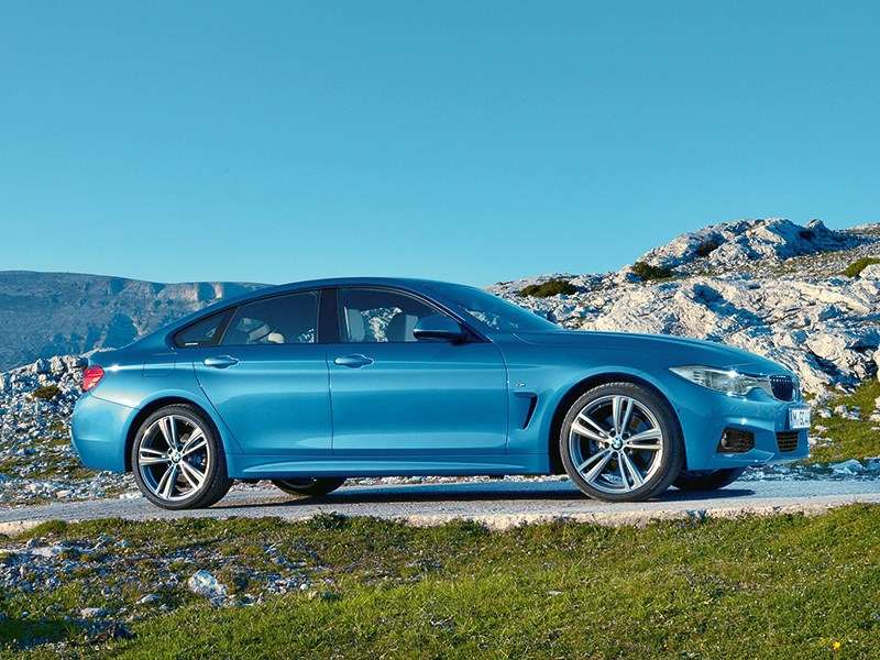 Фото BMW 4 Series Gran Coupe - Gran Coupe кажется более длинным, чем 2-дверное купе 4-й серии, но на самом деле это обман зрения – длина совпадает миллиметр в миллиметр