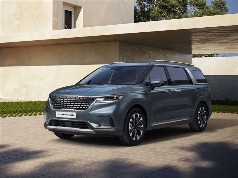 Фото KIA Carnival - Kia Carnival 2021 вид спереди сбоку