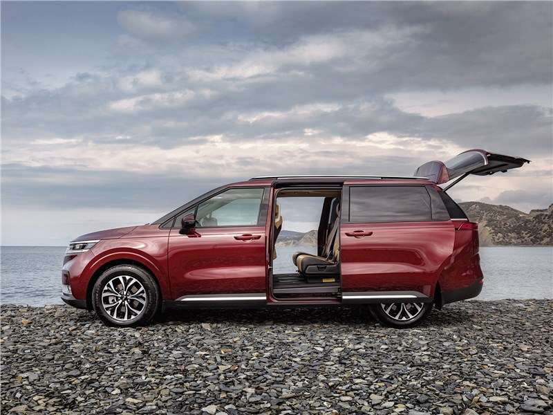 Фото KIA Carnival - Kia Carnival (2021) вид сбоку