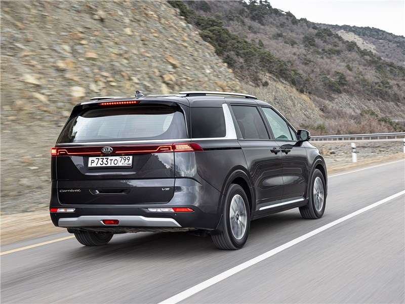 Фото KIA Carnival - Kia Carnival (2021) вид сзади